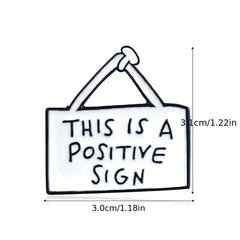 Positive sign enamel pin