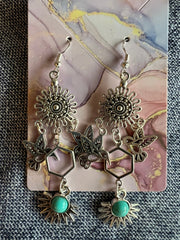Western style handmade earrings in vintage silver