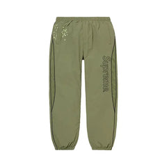 Supreme AOI Glow-In-The-Dark Shell Suit Jogging Khaki